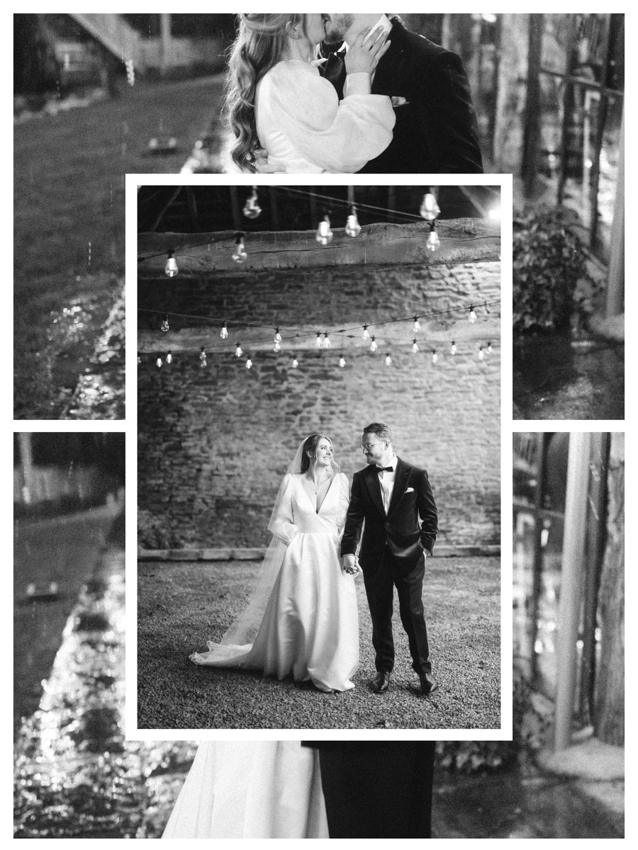 A couple beneath lights in black and white